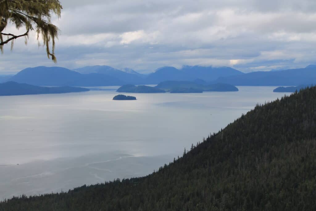 A scenic shot of Alaskan mountains and ocean